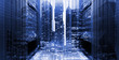 © vladimircaribb - concept of the modern digital world, business buildings of the night metropolis against the background of data center servers. Double exposure