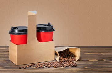 Card-box basket with two paper cups coffee and bag with beans.