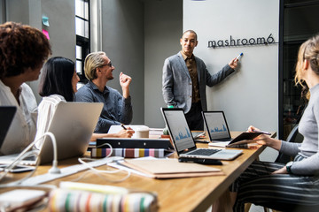 Wall Mural - Group of diverse people having a business meeting