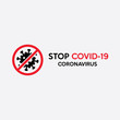 © wheeliemonkey - Covid-19 Coronavirus with cross band typography design logo. A virus in a ban sign Illustration