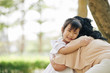 © DragonImages - Crying little Vietnamese girl hugging her grandmother she was missing very much during quarantine period