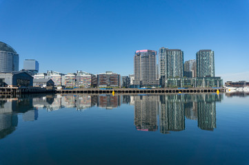 Sticker - Modern luxury apartment buildings with water views.