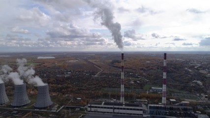 Wall Mural - State District Power Station generating heat and electricity. High pipes and cooling towers are visible. Aerial view.