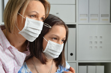 Sticker - Portrait of little girl and mom wearing facial masls