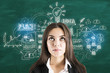 © Who is Danny - Young businesswoman thinking and drawing  business sketch