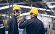 © iStocker - Engineer And Apprentice discussion  in factory