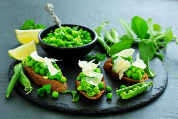 Sticker - Crostini with pea puree, mint and parmesan. Snack.