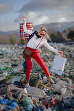Modern Woman On Landfill, Consumerism Versus Pollution Concept.