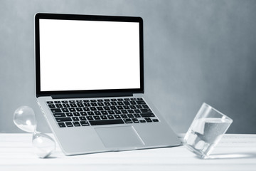 Laptop mockup, computer with blank screen flying under the table. Symbol of lightness freshness airiness. Modern technologies social networks and applications. Copy space