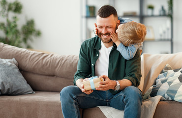 Wall Mural - happy  son congratulates dad for father's day! .