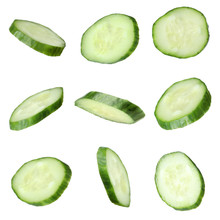 Set Of Fresh Cucumber Slices On White Background
