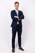 © Ranta Images - Young handsome Scandinavian businessman against white background