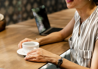 Wall Mural - Japanese woman having a coffee