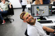 © Rawpixel.com - A happy beard man at office