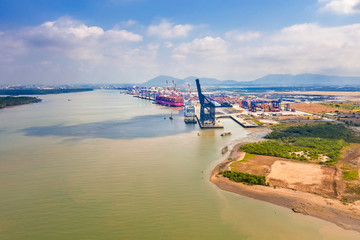 Wall Mural - Top view aerial of International  container port Tan Cang - Cai Mep. Ba Ria, Vung Tau, Vietnam. Connect to Ho Chi Minh City by Thi Vai river and national road 51