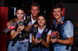 © JackF - friends standing with laser guns during laser tag game