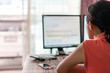 © suwanb - Woman working her job from home by using computer connect to her office.
