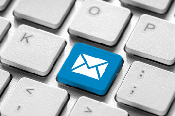 Contact us business icon on computer keyboard