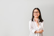 © Pixel-Shot - Cute little businesswoman on grey background