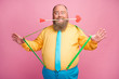 © deagreez - Portrait of his he nice friendly funky glad positive bearded guy holding in teeth mouth amorous arrow pulling suspenders having fun isolated over pink pastel color background
