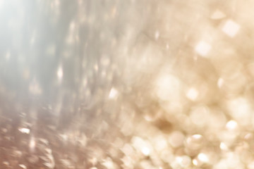 Wall Mural - blurry golden glitter background texture