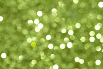 Wall Mural - shiny blurry green glitter textured background