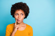 © deagreez - Minded interested afro american girl think thoughts decide decisions choose choice solution look copyspace touch finger face wear style stylish trendy sweater isolated blue color background