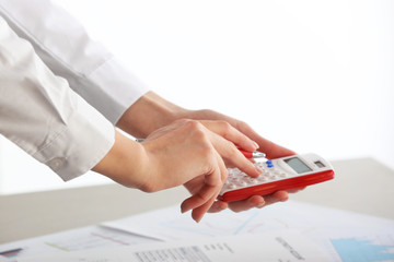 Wall Mural - Female accountant working in office, closeup