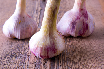 garlic, green, young, on wooden background