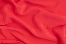 Abstract Background Of Red Silk Fabric. Texture, Luxury, Fashion, Style
