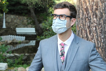 Wall Mural - Fashionable businessman wearing breathing mask 