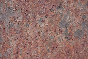 Oxidized metal surface, rust on iron surface, abstract rusty metal panel texture background.