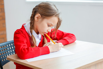 Wall Mural - Pupil passing exam at school