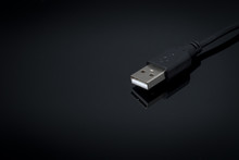 Close-up Of Usb Cable Over Black Background