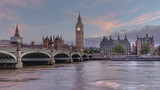 Fototapeta Big Ben - Houses of Parliament with Big Ben and double-decker buses on Westminster bridge at sunset, London, United Kingdom