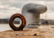 Rusty Iron Mooring Ring By The Sea
