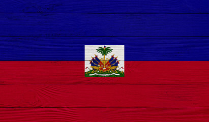 Haiti flag on a wooden texture. Wood texture, planks Wooden texture background flag. Flag painted with paints on wood 