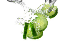 Falling Of Fresh Cucumber Slices Into Water Against White Background