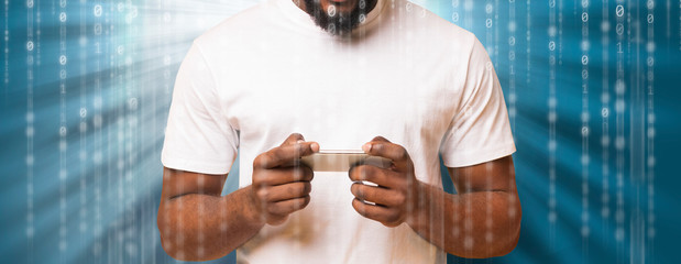 Fototapete - Mobile Security Concept. Black man using phone