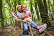 © Westend61 - Children hugging in forest