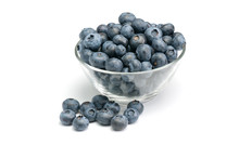 Fresh Wild Blueberries In Glass Bowl Isolated On White Background.