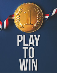 Play to win motivational message with gold winning medal