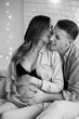 © Wedding photography - Beautiful pregnancy of young family. Pregnant woman and man. Happy couple, wife and husband hugging tummy and kissing
