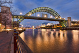 Looking down the Tyne River to Gateshead and the Tyne bridge from Newcastle Upon Tyne Quayside