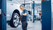 © Gorodenkoff - Blond Female Mechanic is Checing the Tire Pressure in a Wheel of a Vehicle. Empowering Woman Works in a Modern Clean Car Service. Specialists Inflates the Wheel After Fixing a Component on a Vehicle.
