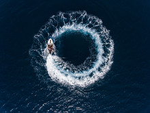 Directly Above Shot Of Boat Making Water Wake In Sea