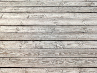 Dark dilapidated cracked boards. Wood old table. Rustic timber texture. Weathered oak planks. Interior decoration. Natural wooden background, pattern.