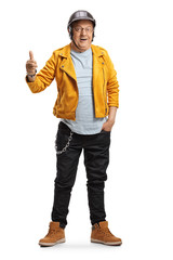 Sticker - Full length portrait of a mature biker in a yellow leather jacket showing thumb up