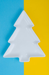 Wall Mural - Empty white christmas tree plate for table Christmas festive setting.