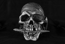 Close-up Of Human Skull Against Black Background